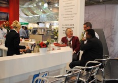 Nick Luiten (Luiten Greenhouses) talking to guests in their booth