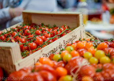 Diepgekleurde cherrytomaten op de stand van de Franse coöperatie Rougeline.