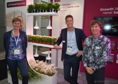 Marielle de Jong, Ries Neuteboom and Wilco Verkuil of Philips. Philips shows its LED Flowering lamp.